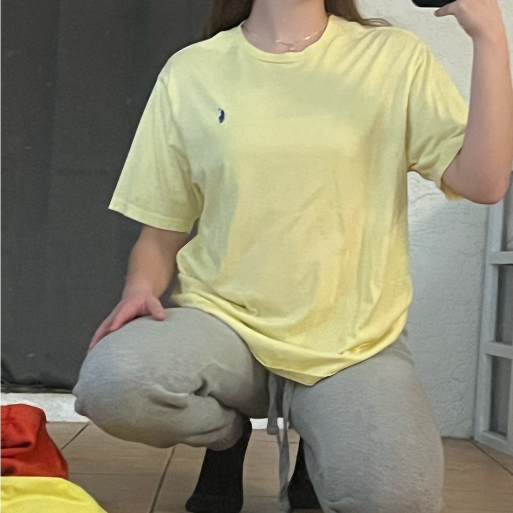 yellow polo shirt